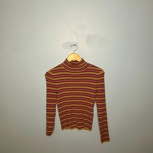A previously loved striped turtle neck from Forever 21.